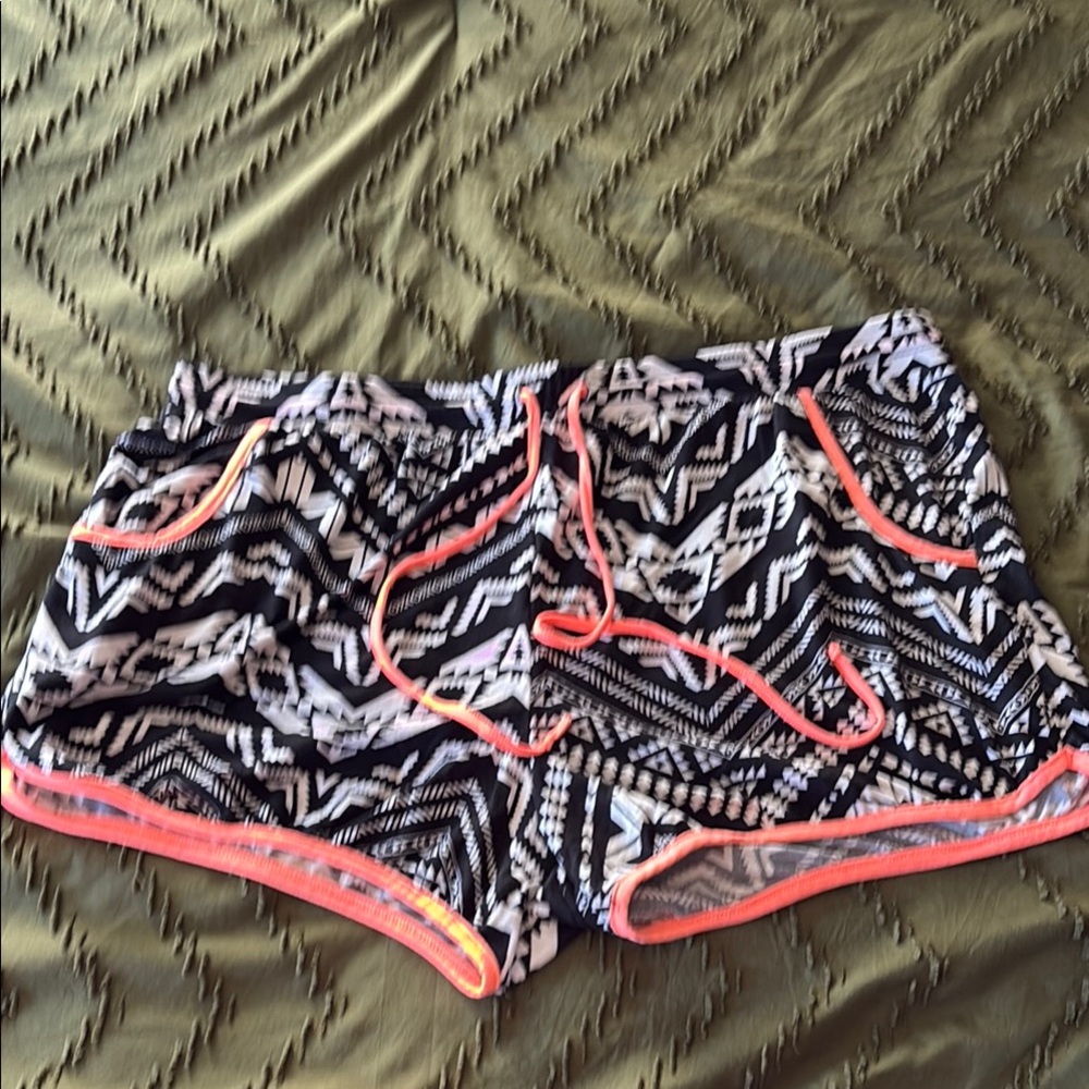 Black and White Geometric Shorts with Coral Trim